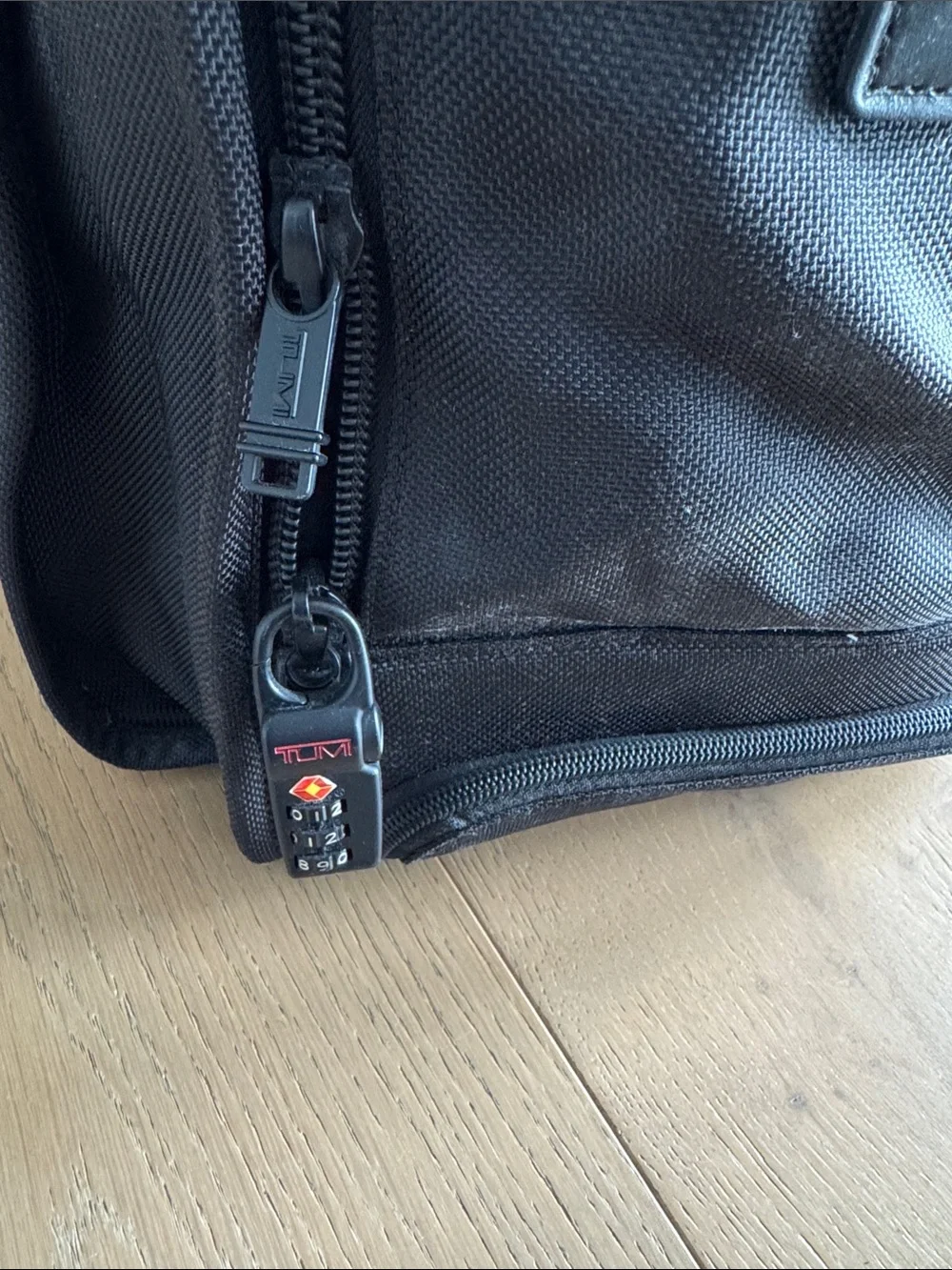 Tumi Black Nylon Duffel Travel Bag with wheels and handle